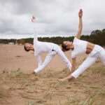 Hatha vs Vinyasa Yoga comparison showing different yoga styles